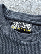 Women's black crewneck sweatshirt with monochrome graphic front print