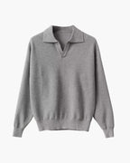 Men's textured knit polo sweater with open V-neck collar and long sleeves