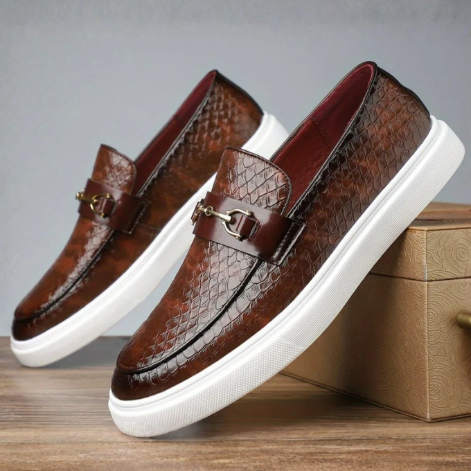 Embossed slip-on loafers with gold bit detail and flat contrasting soles