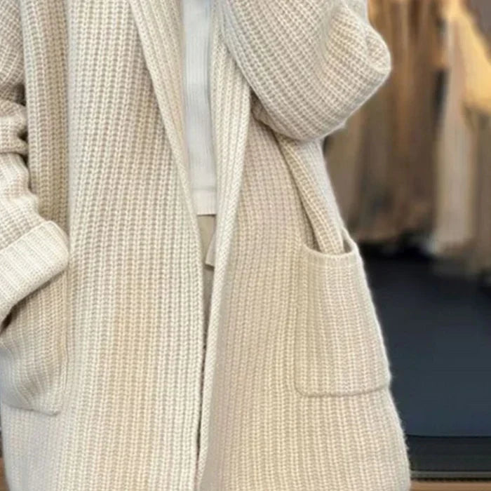 Women's textured open front longline cardigan with long sleeves and patch pockets