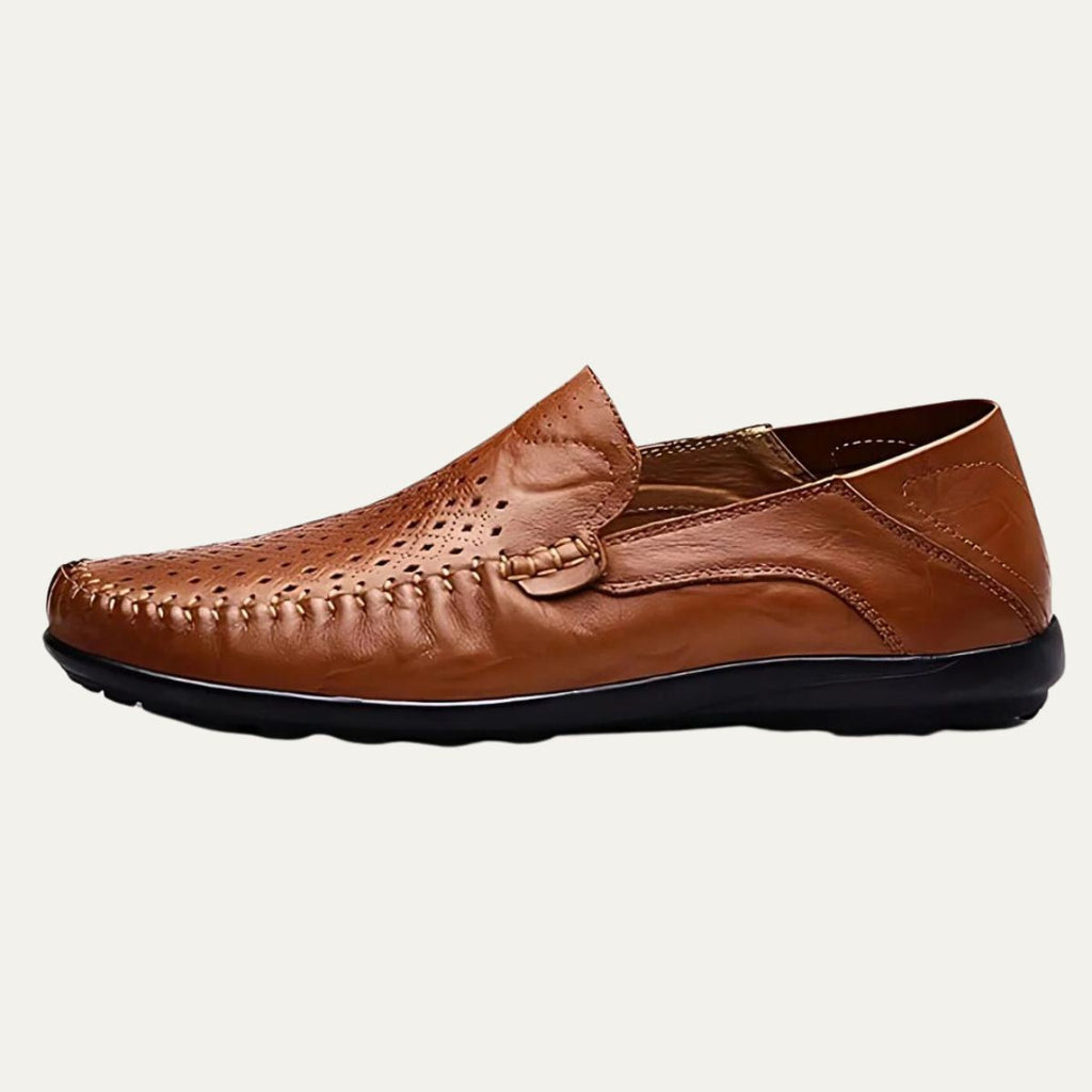 Perforated men's slip-on loafer with rounded toe and flat sole