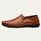 Perforated men's slip-on loafer with rounded toe and flat sole