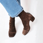 Women's brown ankle boots with square toes, ruched shafts and mid block heels