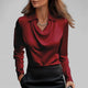 Women's long-sleeve blouse with draped neckline and pointed collar