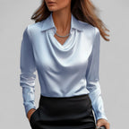 Women's long-sleeve blouse with draped neckline and pointed collar