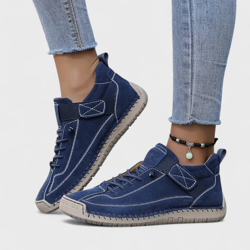 Women's lace-up casual sneakers with ankle strap, stitched panels and textured sole