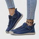 Women's strap sneakers with lace-up fronts and stitched soles
