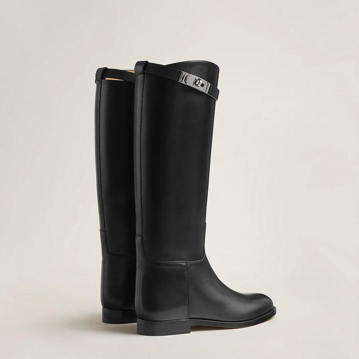 Women's tall riding boots with low heels, round toes and strap detailing