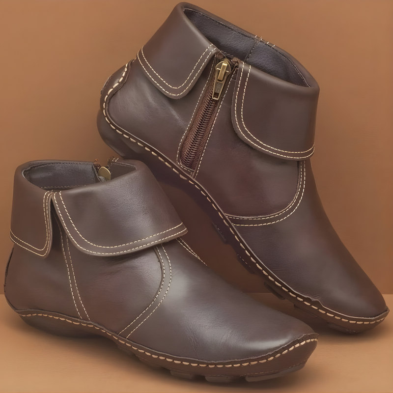 Ankle boots with foldover cuffs, side zips and textured soles