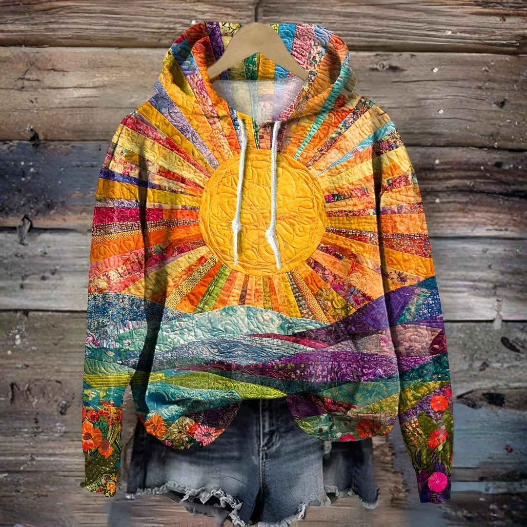 Multicolor patchwork pullover hoodie with sunburst design