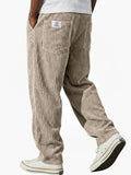Men's straight-leg corduroy trousers with ribbed texture and pockets