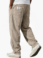 Men's straight-leg corduroy trousers with ribbed texture and pockets