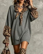 Women's grey sweater mini dress with leopard print scarf collar and cuffs