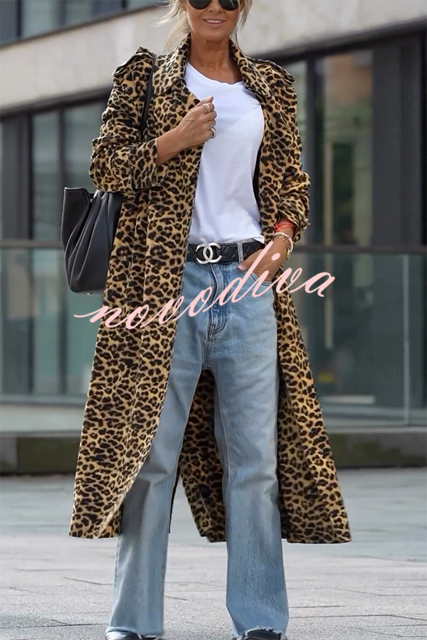 Woman wearing a leopard print long sleeve midi trench coat
