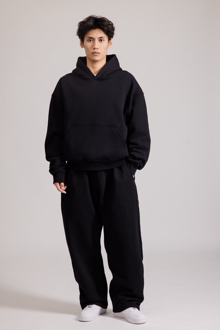 Men's black pullover hoodie with hood and front pouch pocket