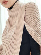 Women's ribbed high neck sweater with an asymmetric split front