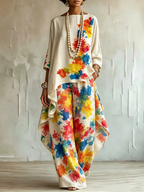 Women's white floral asymmetric blouse with boat neckline