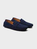 Men's suede boat loafers with rounded moc toe and penny strap detail