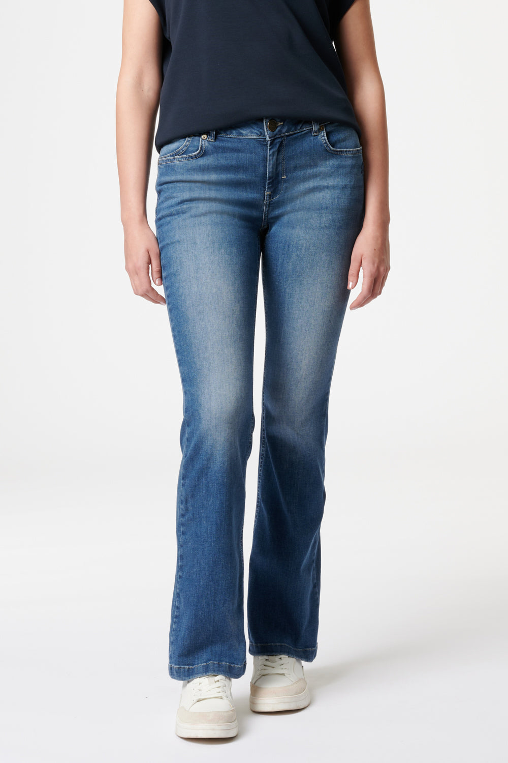 Women's blue bootcut jeans with mid-rise waist