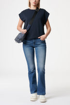 Women's blue bootcut jeans with mid-rise waist