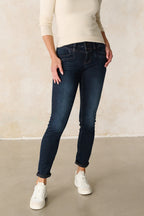 Women's dark blue slim fit jeans with cuffed hems