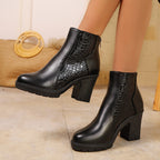 Women's ankle boots with textured panels, high block heels, side zips and lugged soles