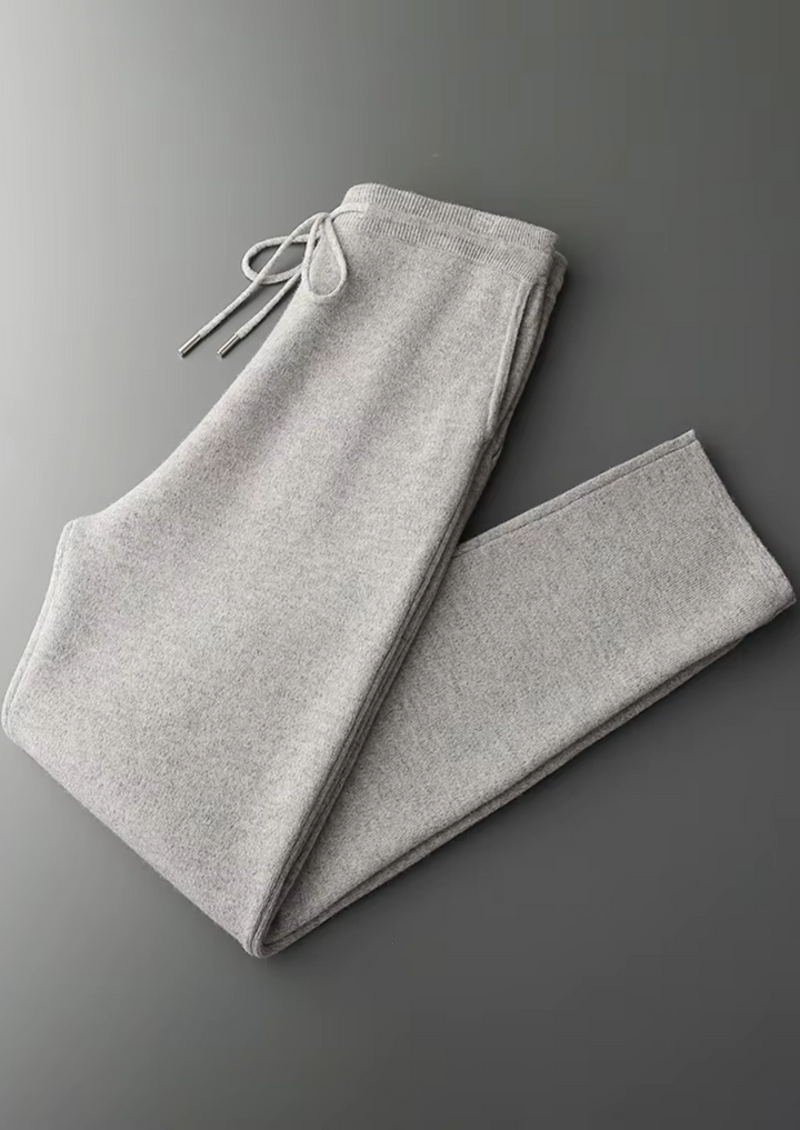Men's two-tone grey knit tracksuit set with a zip jacket and drawstring trousers