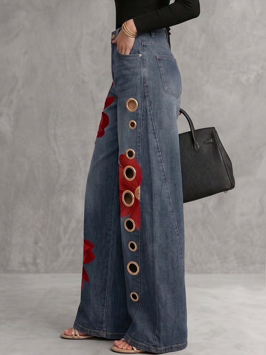 Women's high-waisted wide-leg jeans with red floral embroidery and gold eyelets