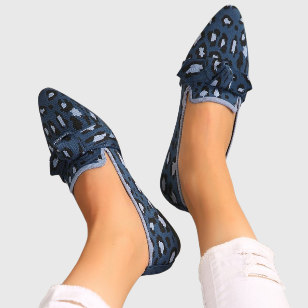 Women's leopard print loafers with pointed toes and bow details