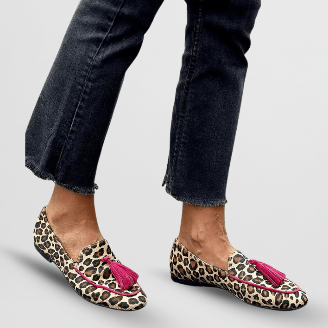 Women's animal print loafers with bright fringe tassel details