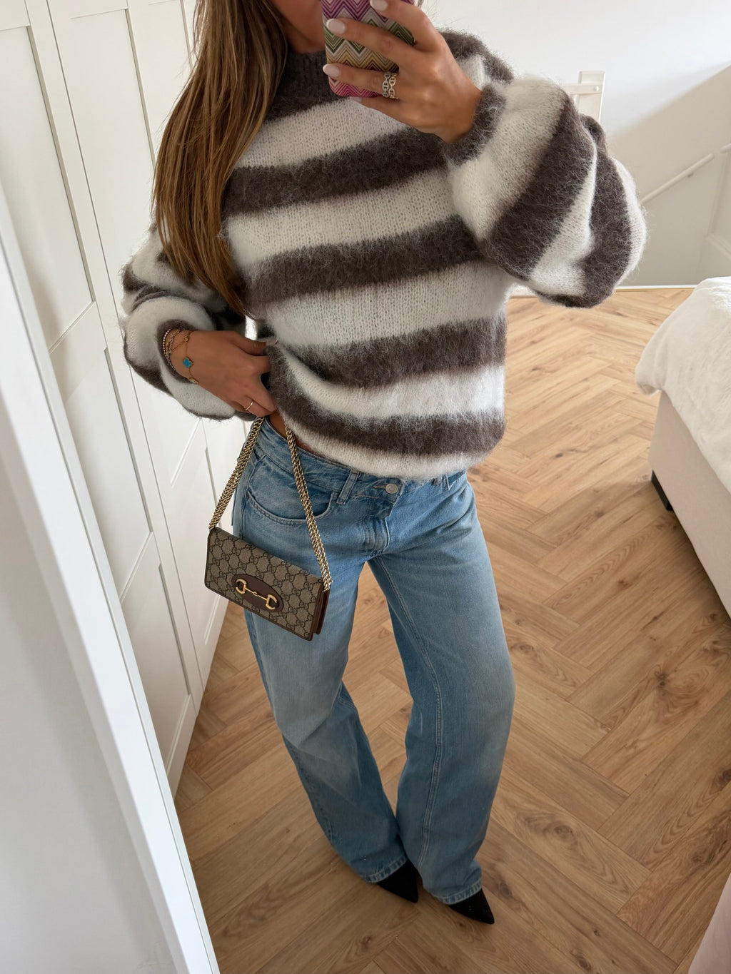 Women's striped mock neck jumper with long sleeves and ribbed trims