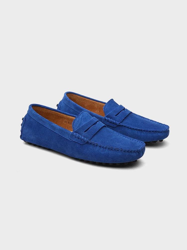 Men's suede boat loafers with rounded moc toe and penny strap detail