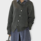 Women's knit cardigan with diagonal button front and long sleeves