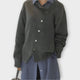 Women's knit cardigan with diagonal button front and long sleeves