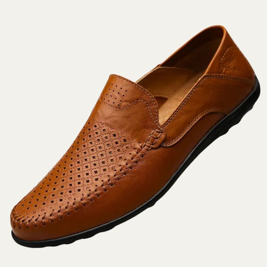 Perforated men's slip-on loafer with rounded toe and flat sole