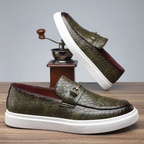 Embossed slip-on loafers with gold bit detail and flat contrasting soles