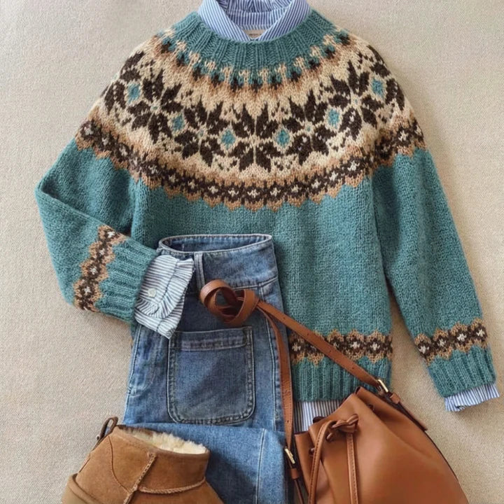 Women's blue Fair Isle knit sweater with high neckline and long sleeves