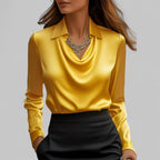 Women's long-sleeve blouse with draped neckline and pointed collar
