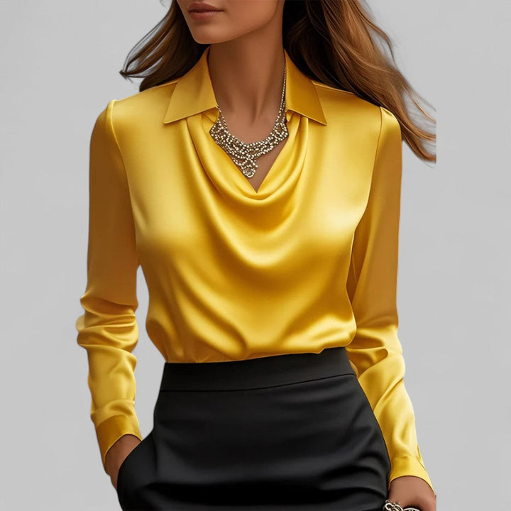 Women's long-sleeve blouse with draped neckline and pointed collar