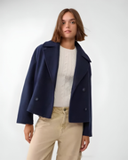 Women's short double-breasted trench coat with wide lapels