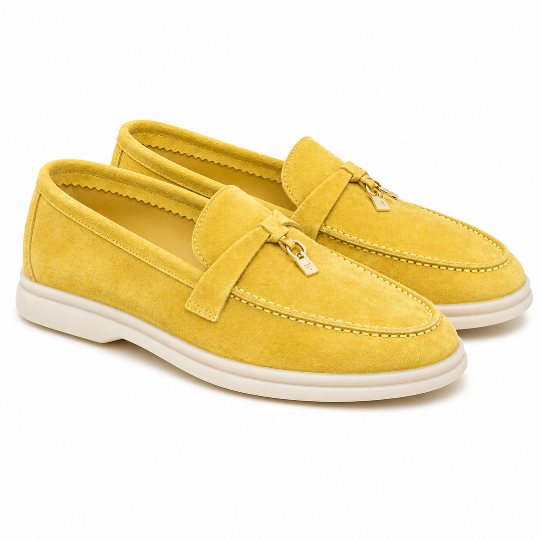 Women's plain loafers with moc toe stitching and decorative bit detail