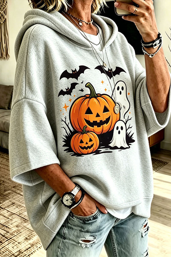 Women's oversized hooded top with pumpkin, bat and ghost Halloween graphic