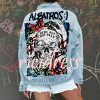 Women's light blue denim jacket with Halloween skull and rose graphic on the back