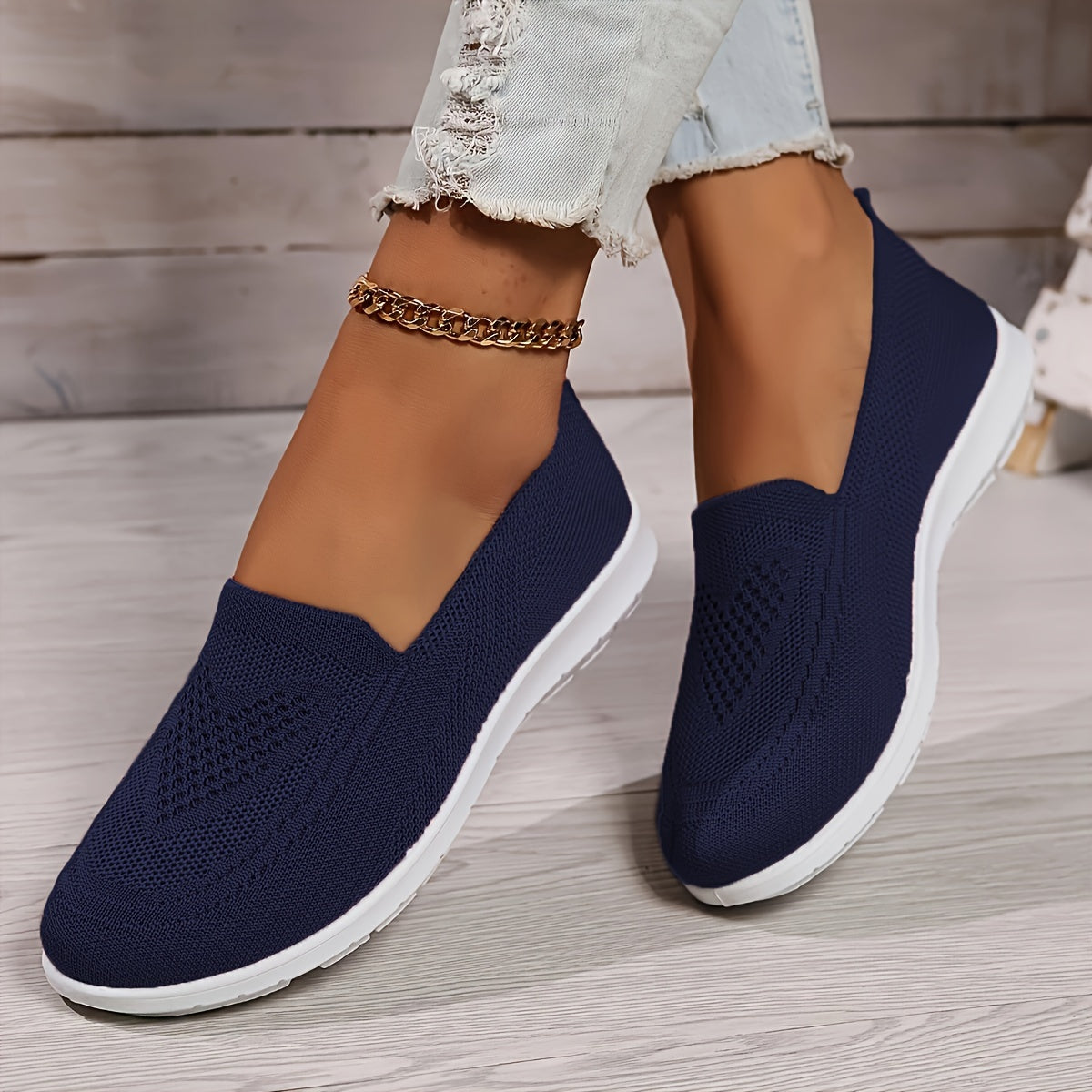 Women's knitted slip-on walking trainer with white flat sole