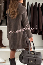 Women's relaxed turtleneck knit sweater with long sleeves and ribbed trims
