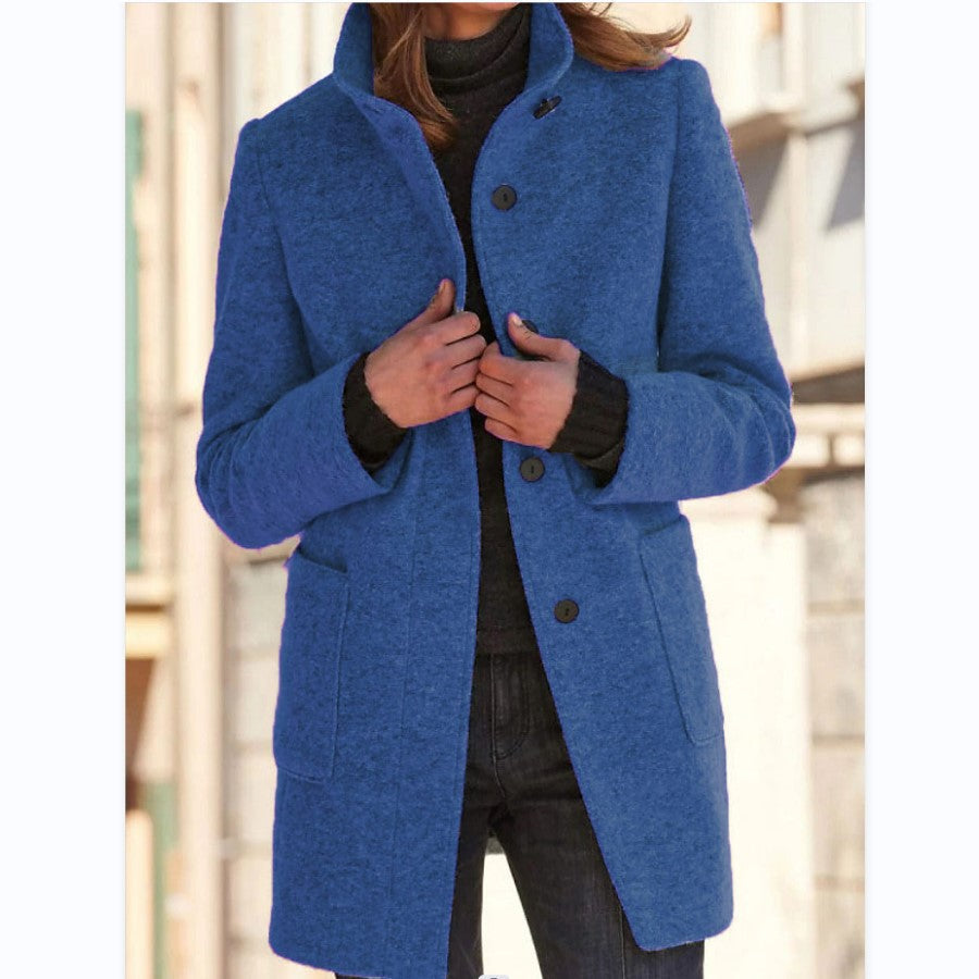 Women's button front coat with raised collar, long sleeves and front pockets