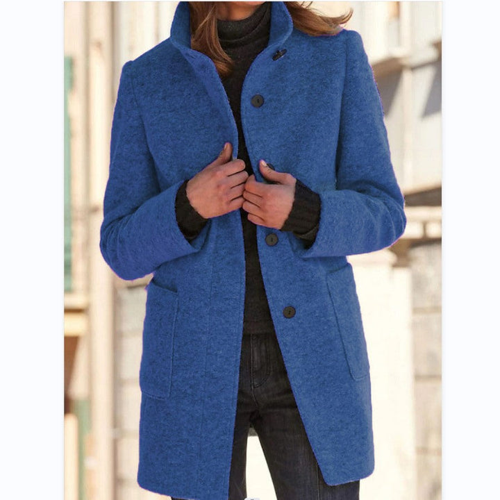 Women's button front coat with raised collar, long sleeves and front pockets