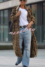 Woman wearing a leopard print long sleeve midi trench coat