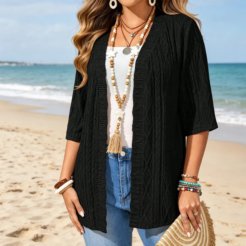 Women's open front textured cardigan with three-quarter sleeves