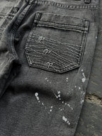 Dark washed wide leg jeans with dragon and floral embroidery